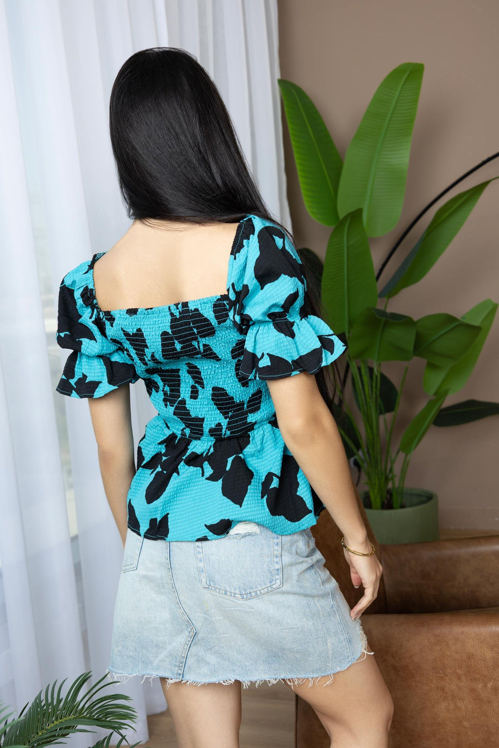 Bailey in Bold Peplum Top In Blue And Black