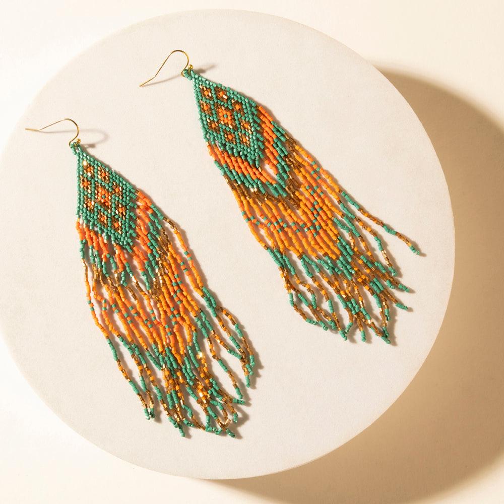Myra Sundance Ember Beaded Fringe Earrings in Gilded Coral