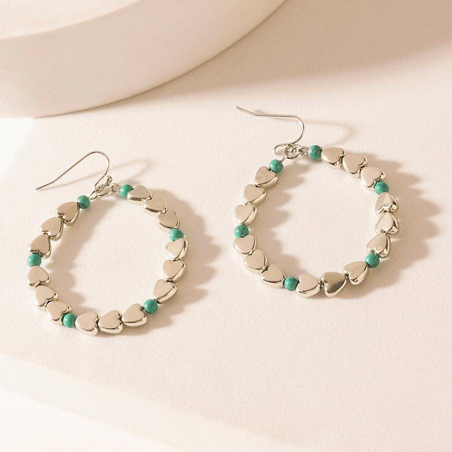 Myra Trail of Hearts Hoop Earrings in Arctic Silver