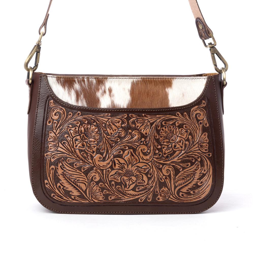 Myra Copper Crest Handtooled Hairon Leather Clutch in Saddle Walnut