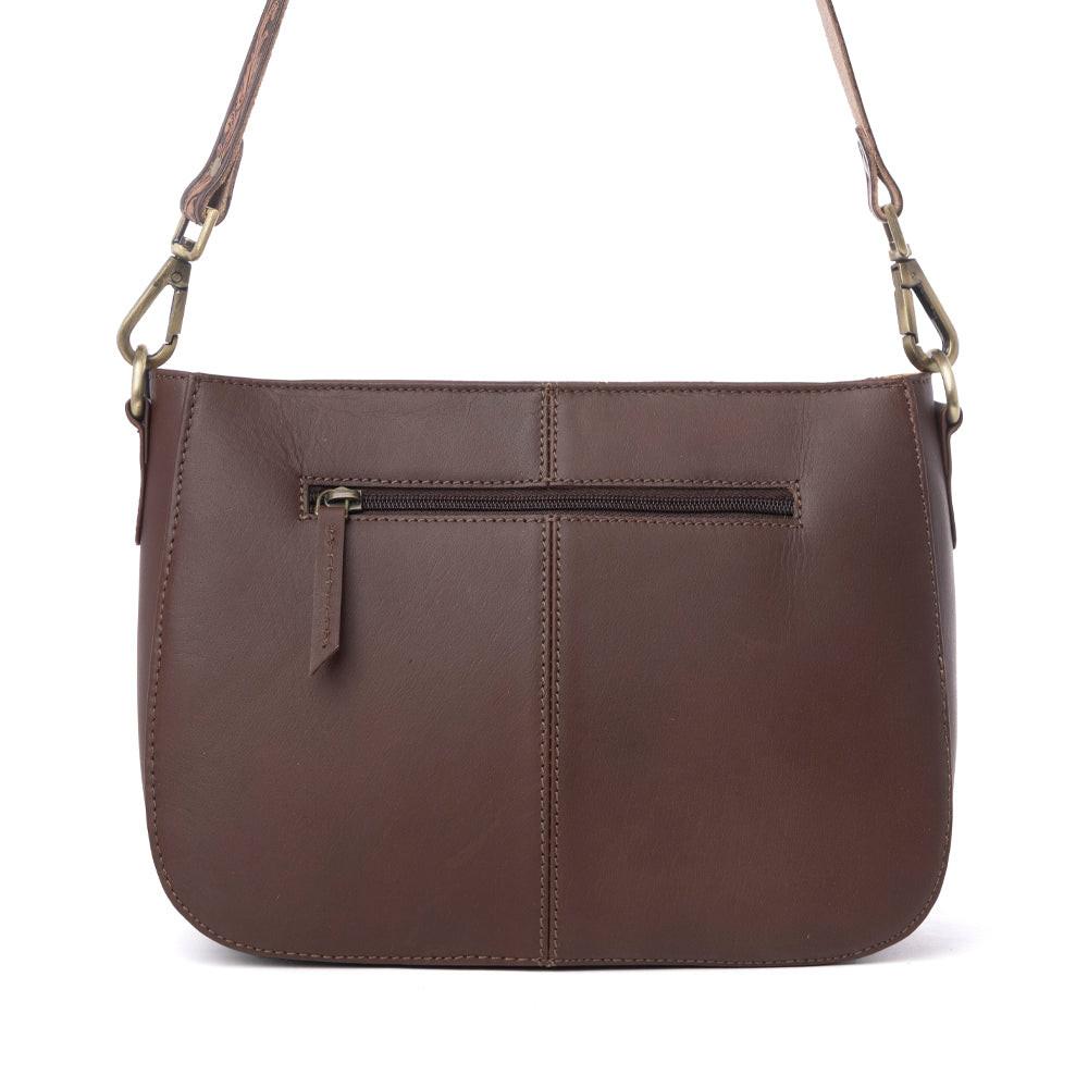 Myra Copper Crest Handtooled Hairon Leather Clutch in Saddle Walnut