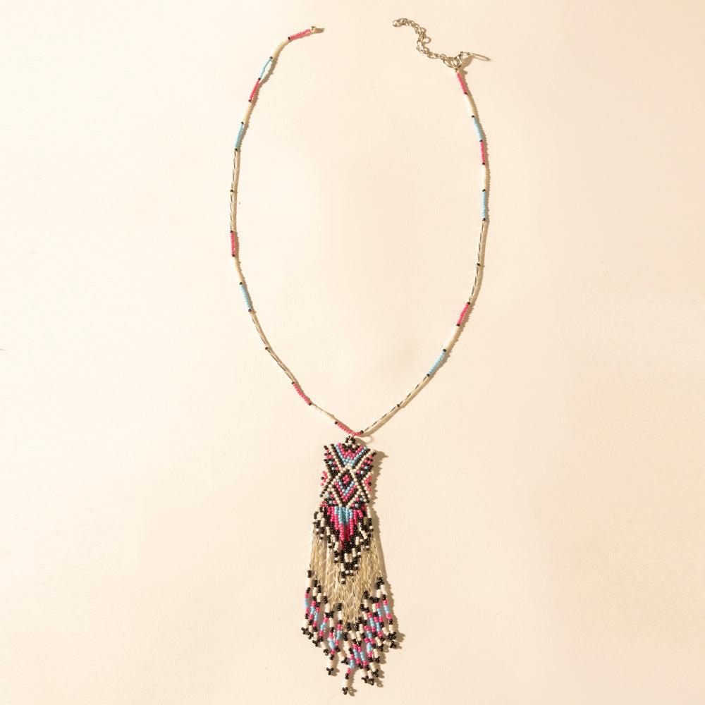 Myra Sky and Coral in necklace in Turquoise