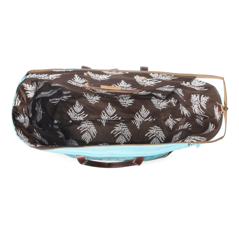 Myra Aztec Sky Western Weekender Bag for Women in turquoise with print detail