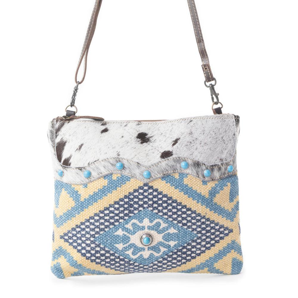 Myra Tufts Pattern Woven Hairon Crossbody â€“ Tribal Geometric Print with Leather Strap and Studded Accents