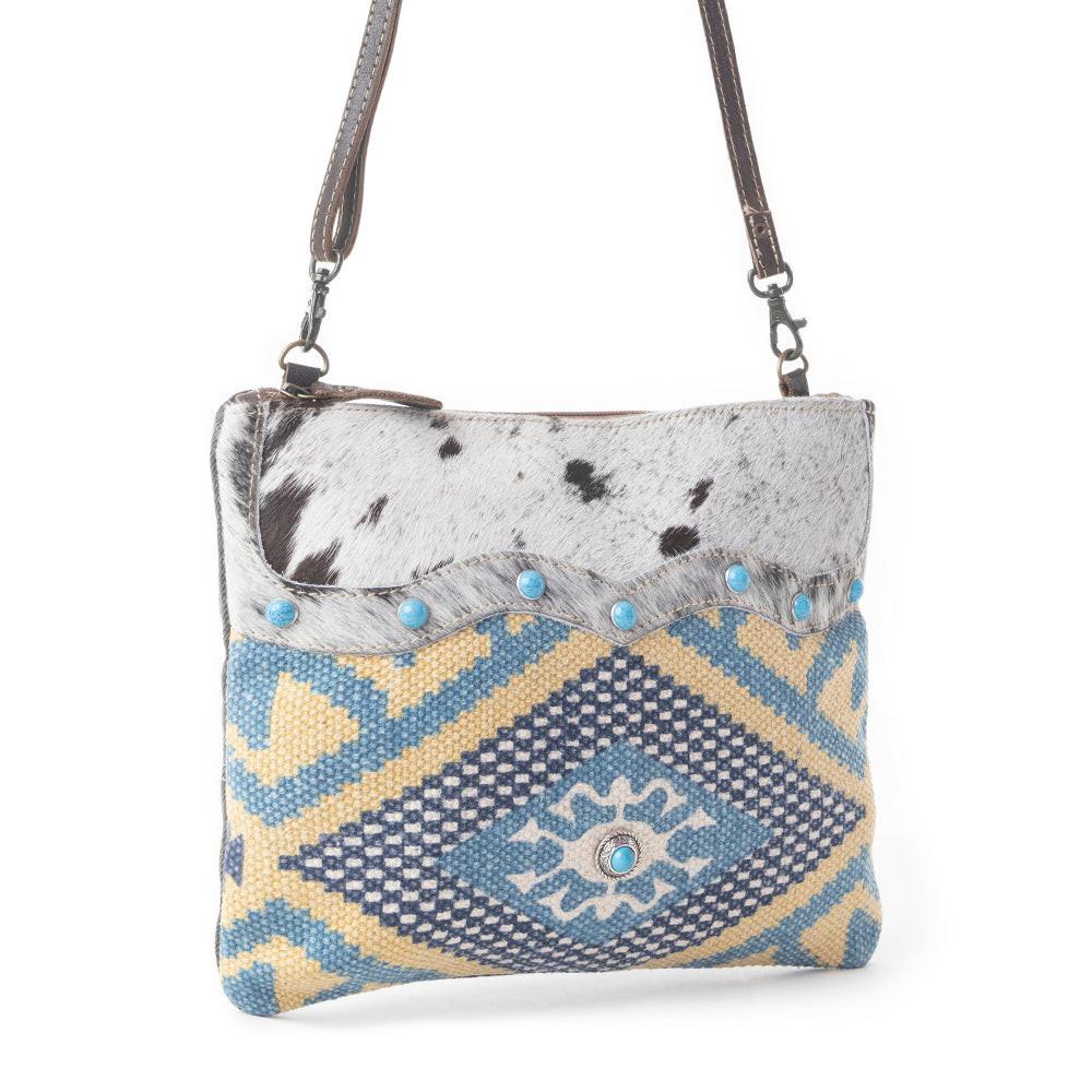 Myra Tufts Pattern Woven Hairon Crossbody â€“ Tribal Geometric Print with Leather Strap and Studded Accents