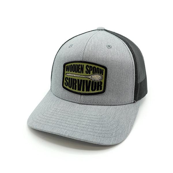 Mütze mit gewebtem Aufnäher "Wooden Spoon Survivor"