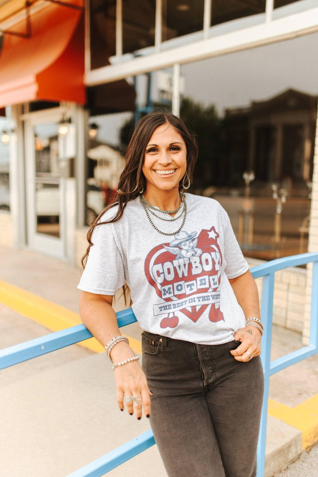 Cowboy Motel Raw Cut V-neck Graphic Tee